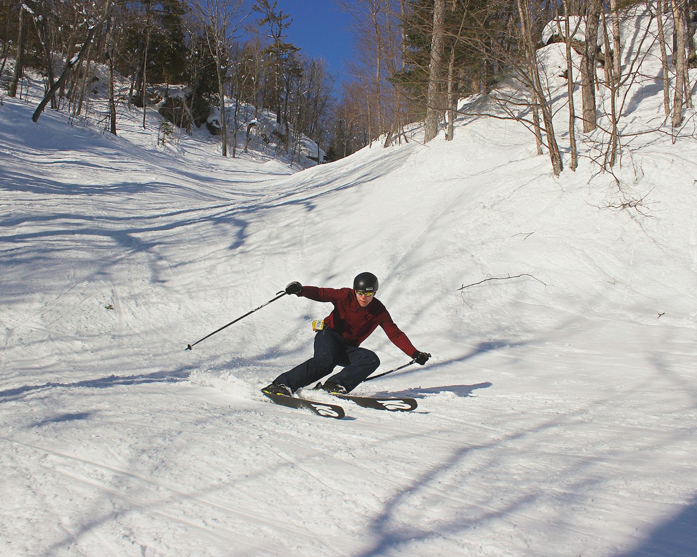 Skier on beautiful wooded run in Pennsylvania